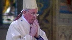 Cardinal Brady clings to office