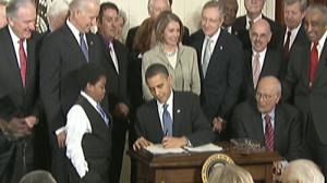 US Democrats party after Obama signing