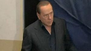 Berlusconi avoids bloody nose in regional poll