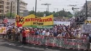 Greeks protest austerity before violence flares