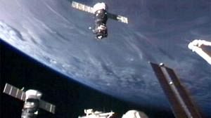 Space station crew redocks Soyuz capsule