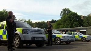 UK police find fugitive killer suspect’s camp