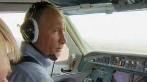 Putin takes to the skies to tackle fires