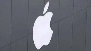 Apple manager charged over bribes
