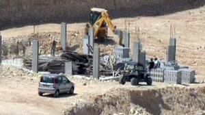 Peace talks threatened as W Bank building resumes