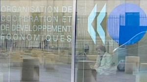 OECD reports says world recovery will slow down