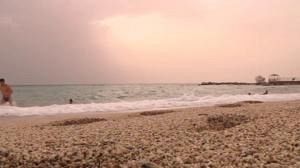 While the north freezes, Greeks go to the beach
