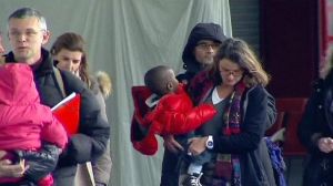 Haitian orphans arrive in France