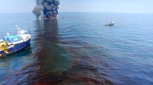 BP shares jump after US report spreads spill blame
