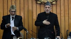 Karzai backs down and opens Afghan parliament