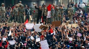 Suez marches on in defiance of protest ban
