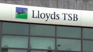 Lloyds back in profit, but Irish loan losses mount