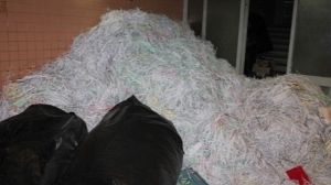 Protesters find shredded papers in secret police HQ