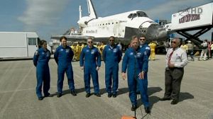 Discovery glides into history