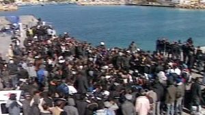 Italy calls for EU to share migrant burden
