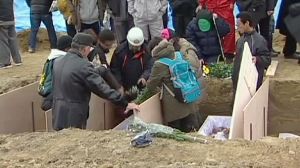 Funeral traditions fall apart after Japan’s tsunami