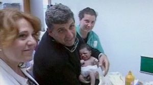 Baby joy after refugee voyage from Libya