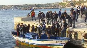 Priest says SOS call by migrants ignored by NATO