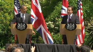 Obama and Cameron talk tough on jobs and Libya