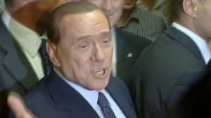 Berlusconi’s sex trial resumes amid poll defeat