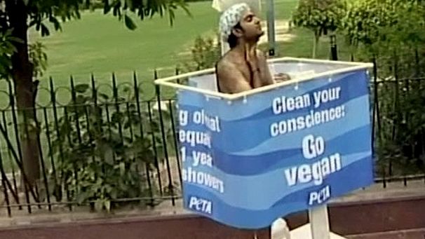 India: PETA activist showers in public to highlight water waste