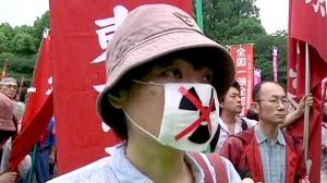 Protests mark three-month Fukishima anniversary