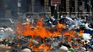 Rubbish row rumbles on in trash strewn Naples