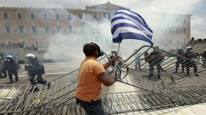 Greece austerity plan passes despite protests