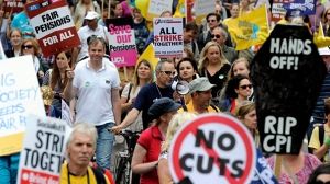 British teachers and civil servants stage strike over government cuts