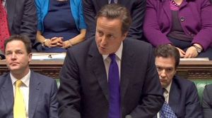 Cameron emerges battered from stormy debate