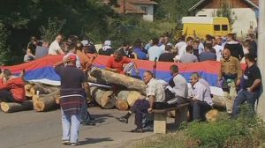 NATO removes Serbia-Kosovo border roadblocks