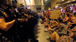 Spain’s Indignants march again after clashes