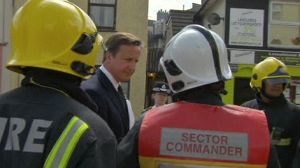 Cameron promet davantage de policiers et une justice sans faille contre les émeutiers