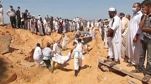Rush to bury bodies in Tripoli