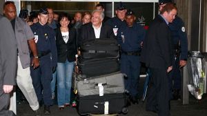 DSK back to catcalls and cheers