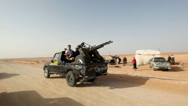Libyan rebels capture airport connecting loyalist strongholds