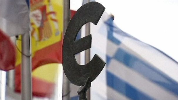 ECB signals rates on hold as euro zone economy weakens