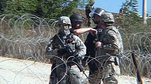NATO troops demolish Kosovo border barricade