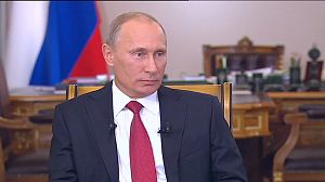 Putin defends his bid to return to the Kremlin