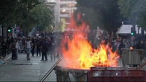 Greece adopts austerity law despite protests