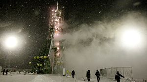 Three blast off in Soyuz after ban on manned flights lifted