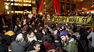 Evicted Wall St protesters return minus their tents