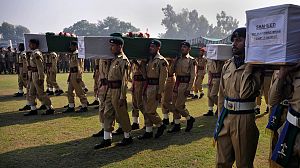 Pakistan holds funerals for troops after NATO raid