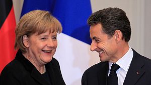 Euro crisis: Merkel and Sarkozy say we need change