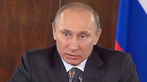 Putin lashes out at Clinton over protests
