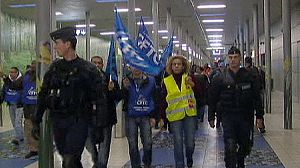 French PM defends use of police in airport strike