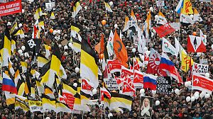 Mass rally in Moscow piles more pressure on Putin