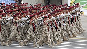 Iraq’s army parades as rocket fire hits Green Zone