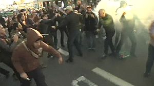 Troika back Portugal reforms as violence flares