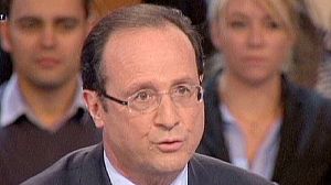 Hollande locks horns with Juppe in TV debate